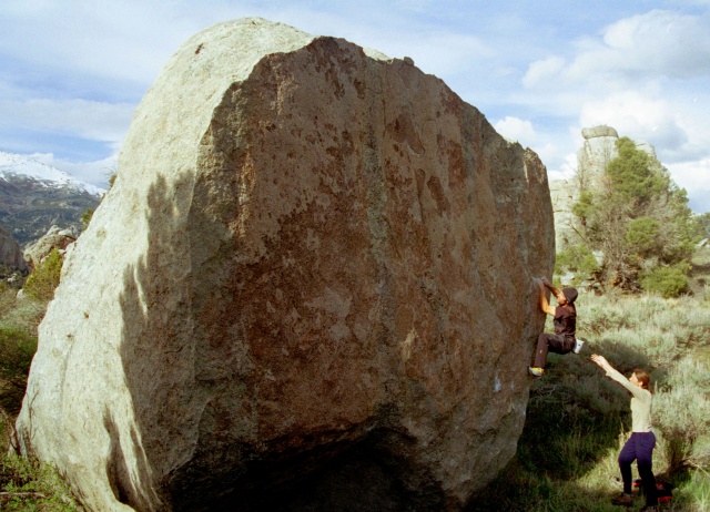 Brent gets a spot from Janelle.  This boulder is on the NW corner of Lone Rock.