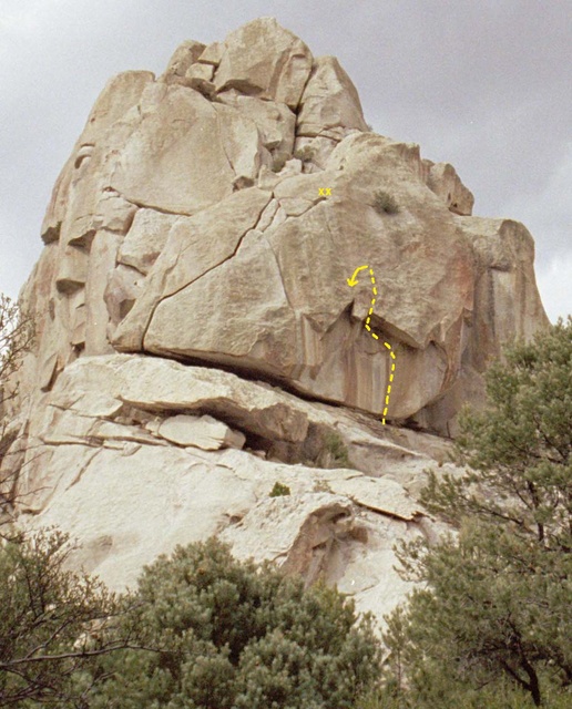 This formation is un-named, but is marked on the Castle Rock entrance Kiosk as "BLM Highpoint".  

The route shown is "The Rising", 5.13a, ending at a stance above the roof.  The entire crack all the way to the bolts is currently an aid route named "Dad Blaster", first climbed by Brad Schilling.  The final section that hasn't been freed is basically a steeper, thinner version of the "Green A" and should go at around 5.11.