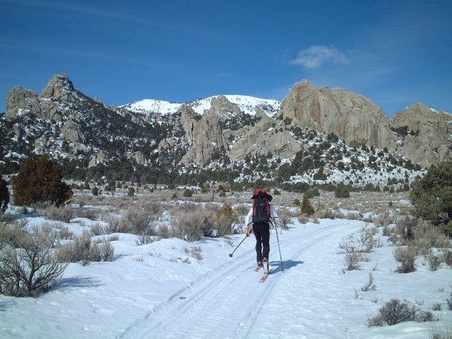 Skiing out to the Comp Wall on a nice day in February.  The snowmobiles have packed out a pretty good trail, but once you leave the road to head up to the rock, skis are a must. 
