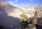 The left fork of Hogum's Fork.  From this point at the base of the Pfeifferhorn, the trail descends to the talus field, crosses it, then goes around the toe of the ridge in the distance.