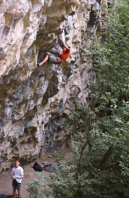 Jared McMillen in the crux and sending "The 7PM Show" Rifle, CO.